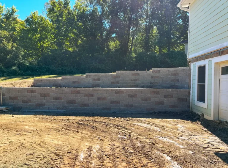 retaining wall installed next to house's foundation edwardsville il