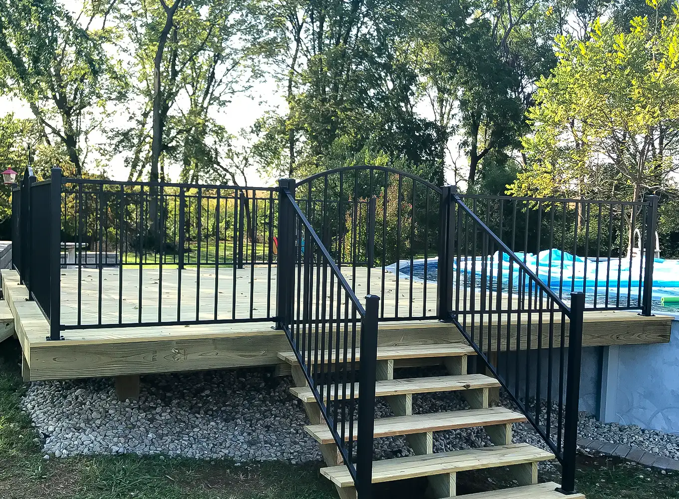 aluminum fence around a wooden pool deck edwardsville il